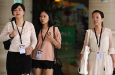 論壇上的美女記者和志愿者