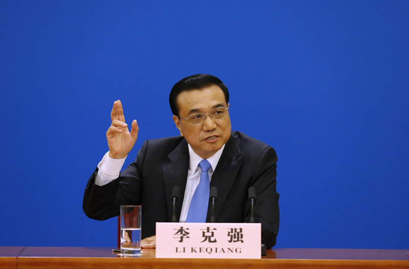3月15日，國務院總理李克強在北京人民大會堂與中外記者見面，并回答記者提問。 新華社記者 沈伯韓 攝