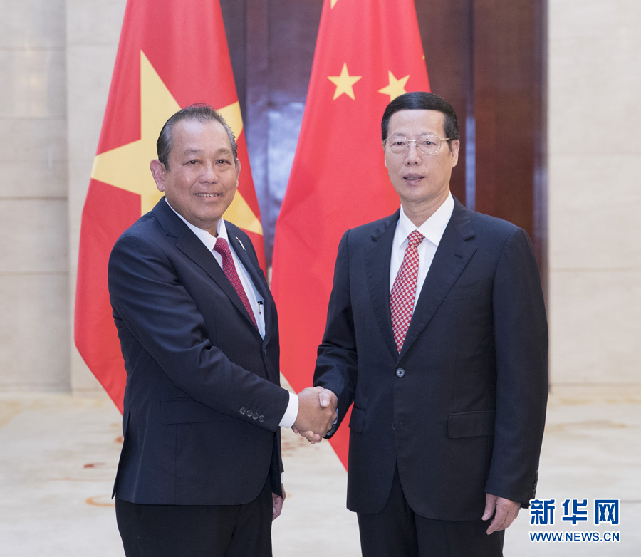  9月11日，中共中央政治局常委、國(guó)務(wù)院副總理張高麗在廣西南寧會(huì)見前來出席第十四屆中國(guó)－東盟博覽會(huì)和中國(guó)－東盟商務(wù)與投資峰會(huì)的越南常務(wù)副總理張和平。新華社記者王曄攝