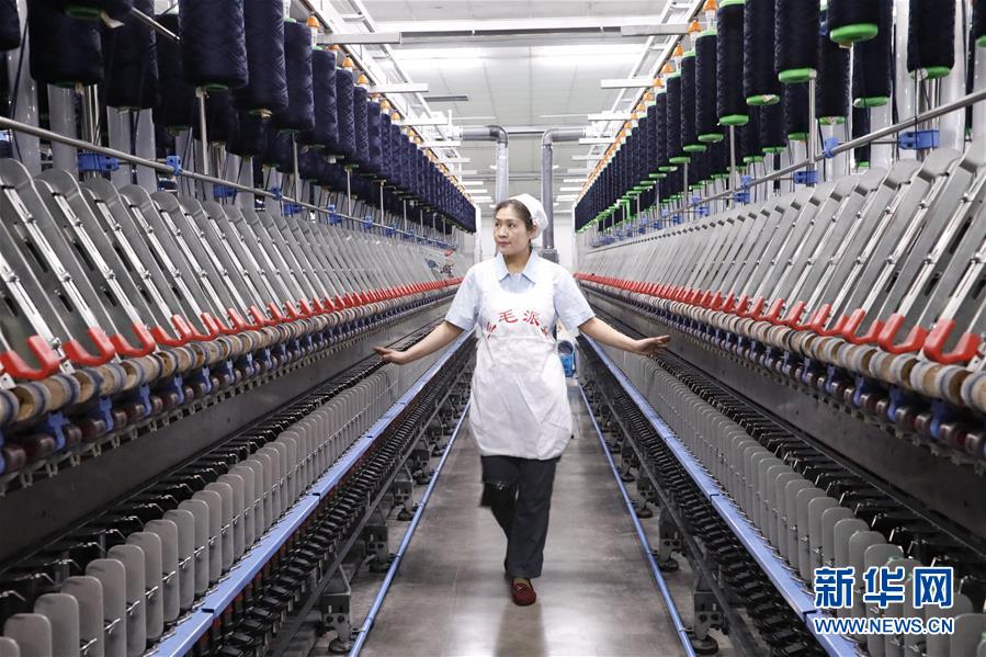 （代表委員履職·圖文互動）（1）全國人大代表范冬云：紡織業需科技“造血”