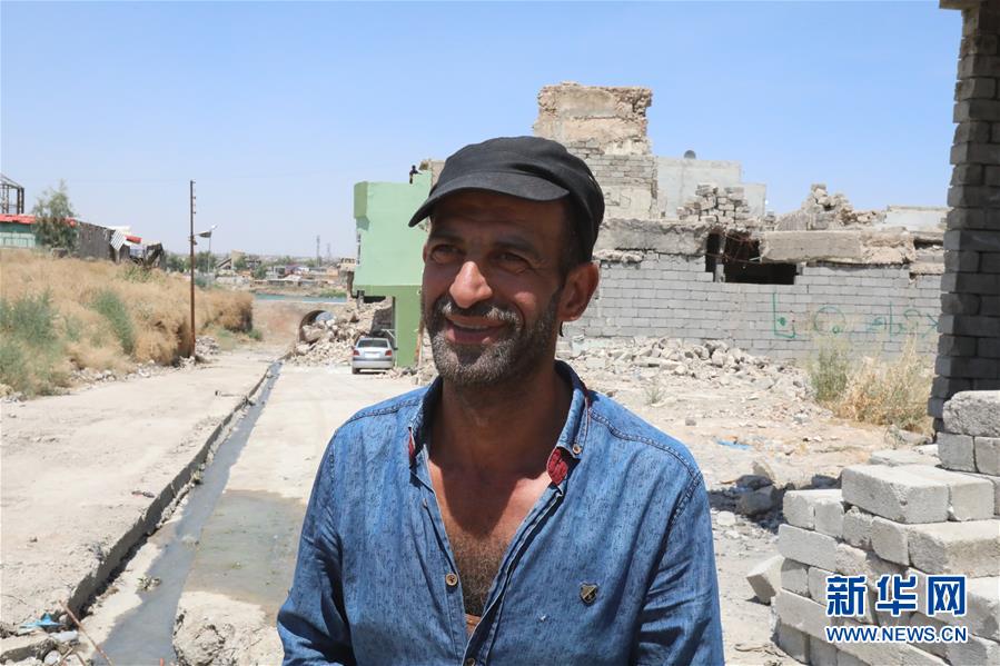 (國際·圖文互動)(4)通訊:中企員工愛心捐款助摩蘇爾老城民眾重燃生活希望