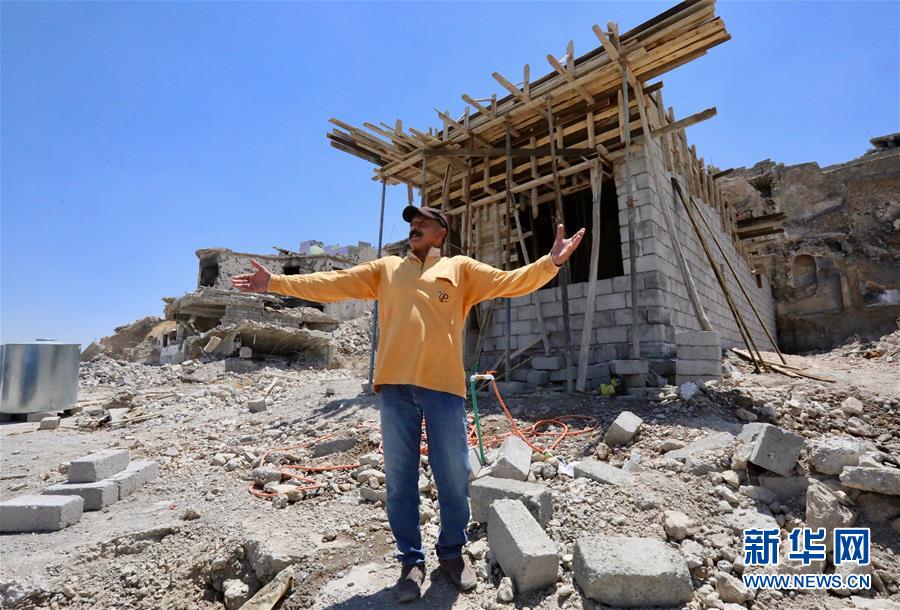 (國(guó)際·圖文互動(dòng))(5)通訊:中企員工愛(ài)心捐款助摩蘇爾老城民眾重燃生活希望