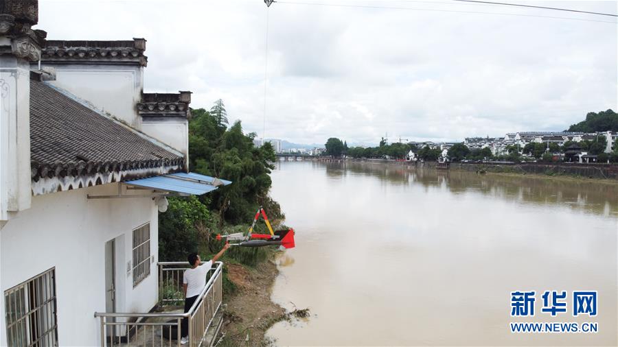(防汛抗洪·圖文互動)(5)暴雨洪峰中的“瞭望者”